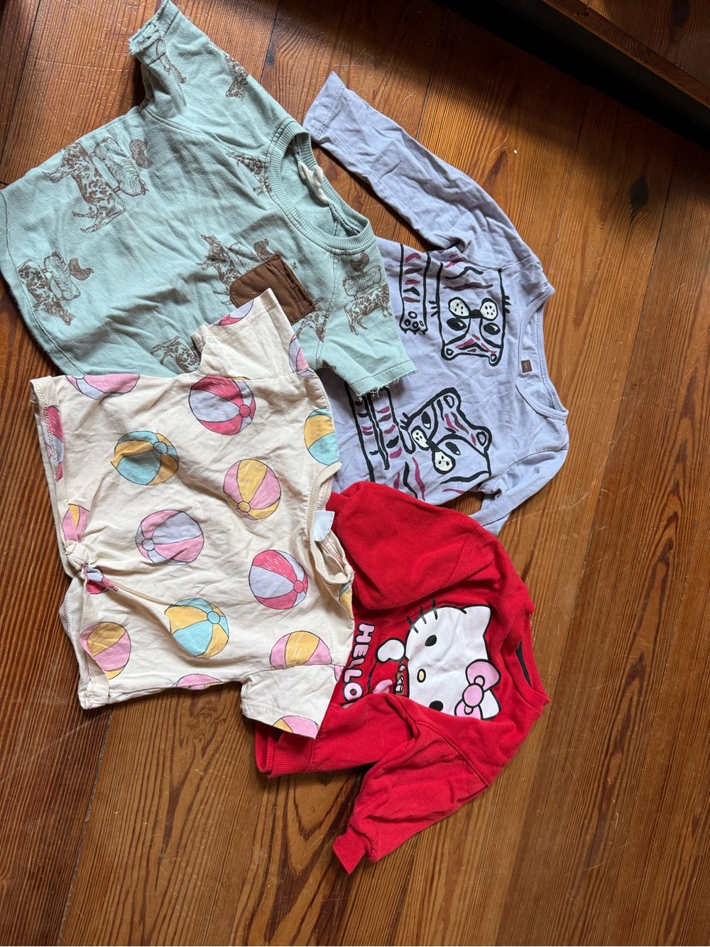 Set of 4 Toddler Tops - Beach Ball, Hello Kitty, Graphic Cats, Dino Pocket